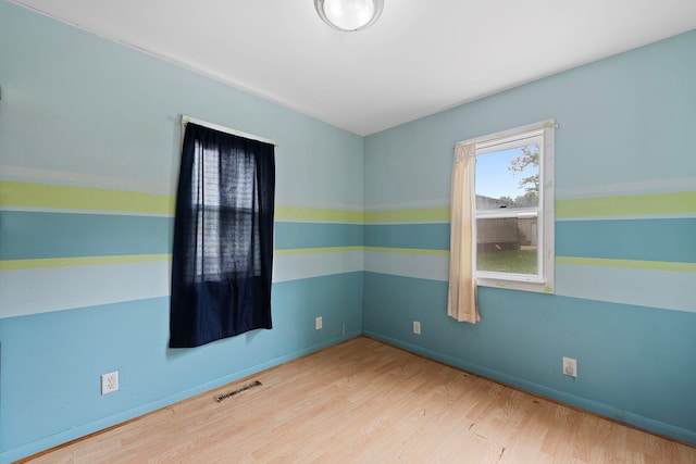 5460B W State Route 17, Kankakee, IL 60901 - spare room with wood finished floors and baseboards