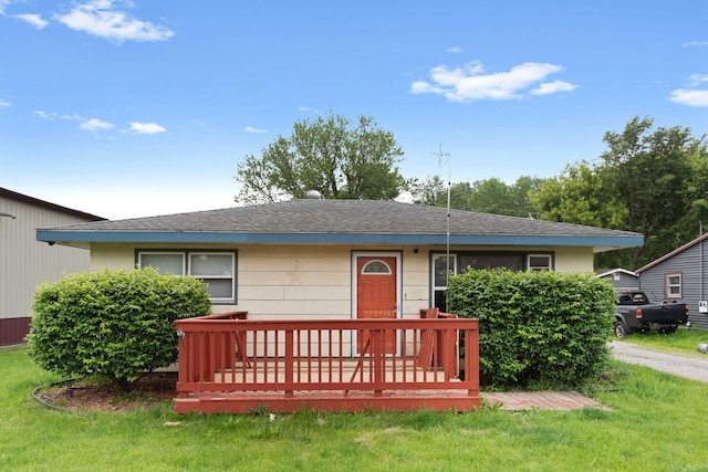 5460B W State Route 17, Kankakee, IL 60901 - ranch-style house with a front yard, a wooden deck, and roof with shingles