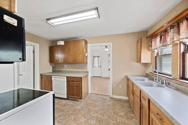 5460B W State Route 17, Kankakee, IL 60901 - kitchen featuring white dishwasher, range, brown cabinetry, ceiling fan, and light countertops