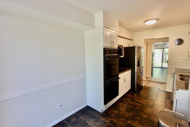 10 Old Oak Dr Unit 103, Buffalo Grove, IL 60089 - kitchen with stainless steel fridge, white cabinetry, tasteful backsplash, and baseboards