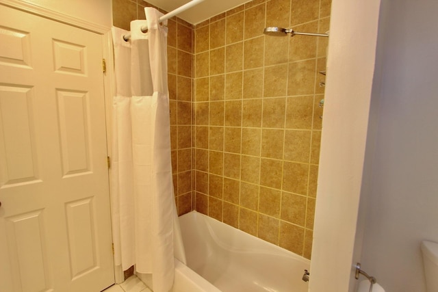 10 Old Oak Dr Unit 103, Buffalo Grove, IL 60089 - full bathroom featuring shower / bath combo with shower curtain and tile patterned floors