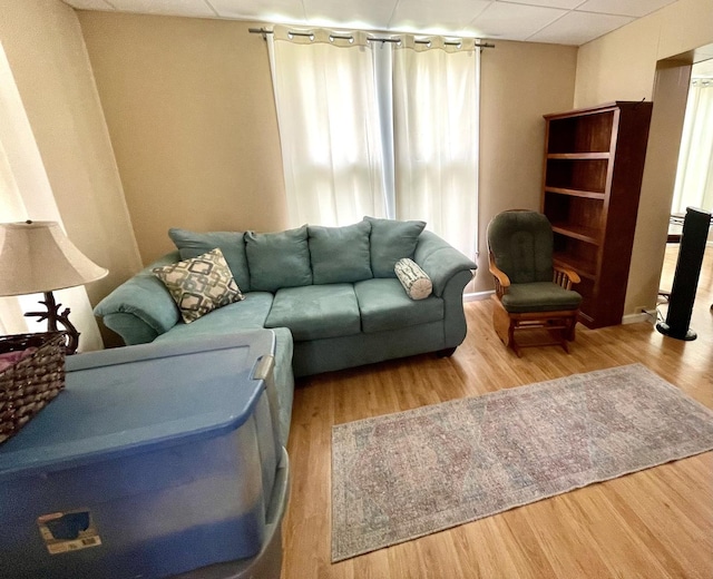 1003 3rd St, Lasalle, IL 61301 - living area featuring a drop ceiling and wood finished floors
