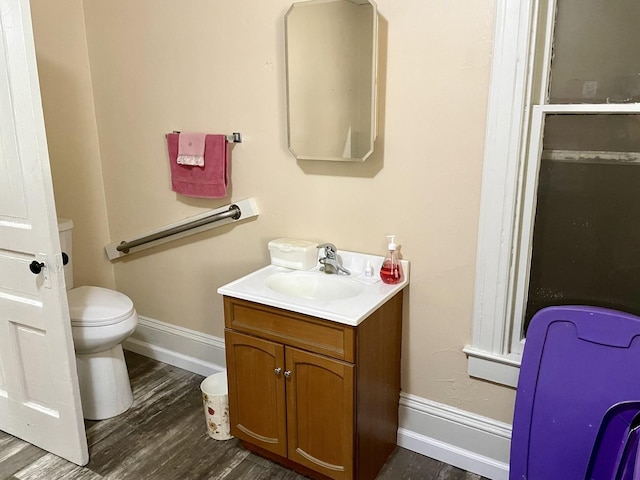 1003 3rd St, Lasalle, IL 61301 - bathroom featuring vanity and wood finished floors