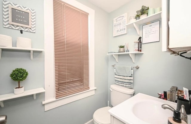 3102 Edina Blvd, Zion, IL 60099 - bathroom featuring toilet and a sink
