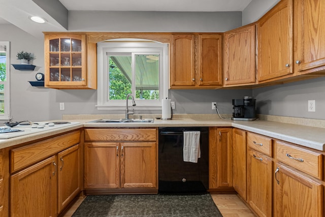 1716 Park Haven Dr, Champaign, IL 61820 - kitchen featuring dishwasher, a sink, white electric stovetop, healthy amount of natural light, and recessed lighting