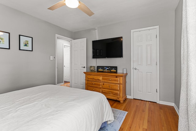 1716 Park Haven Dr, Champaign, IL 61820 - bedroom with light wood-style flooring, baseboards, and ceiling fan