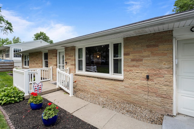 1716 Park Haven Dr, Champaign, IL 61820 - property entrance featuring stone siding and a garage