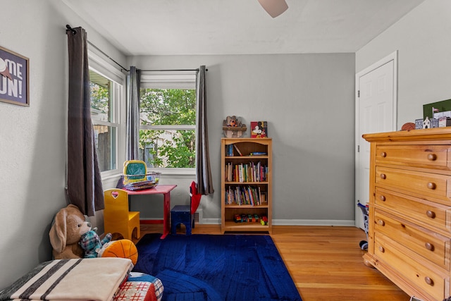 1716 Park Haven Dr, Champaign, IL 61820 - bedroom with wood finished floors, baseboards, and ceiling fan