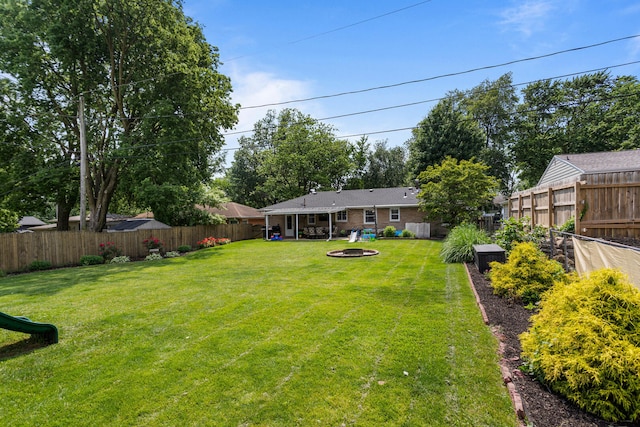 1716 Park Haven Dr, Champaign, IL 61820 - view of yard featuring an outdoor fire pit