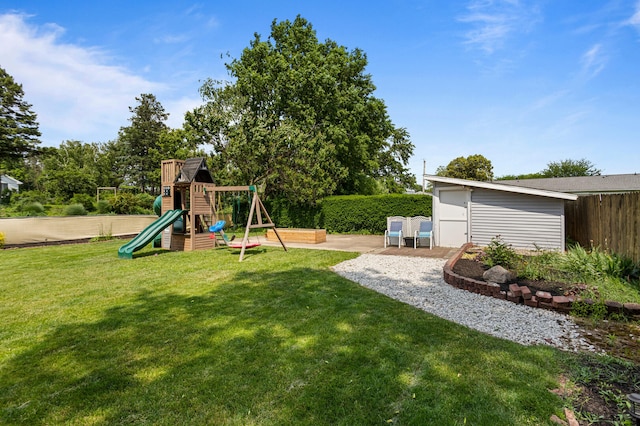 1716 Park Haven Dr, Champaign, IL 61820 - view of yard with a playground and an outdoor structure