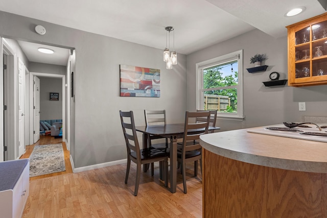 1716 Park Haven Dr, Champaign, IL 61820 - dining area featuring light wood-type flooring and baseboards
