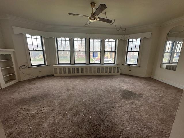 unfurnished sunroom with radiator