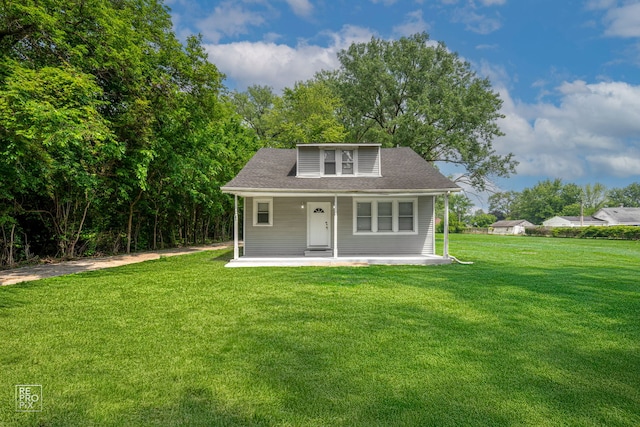 13739 Kildare Ave, Crestwood, IL 60418 - bungalow featuring a front yard and covered porch