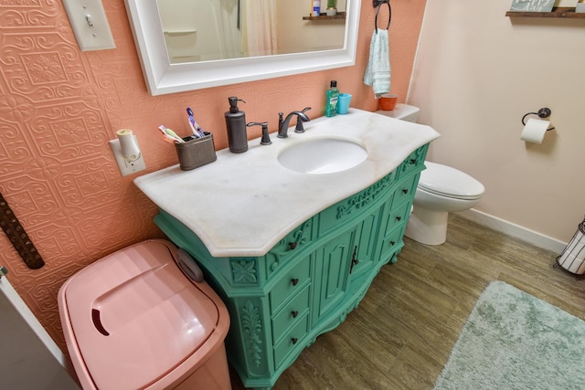 502 Short St, Cornell, IL 61319 - bathroom with wood finished floors and vanity