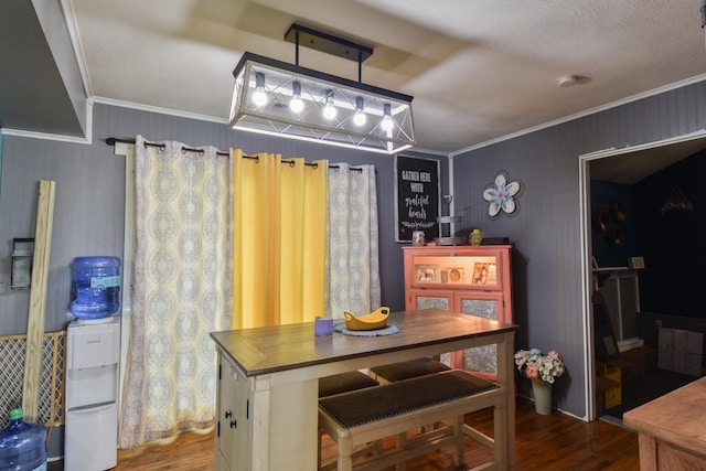 502 Short St, Cornell, IL 61319 - dining space featuring wood finished floors and crown molding