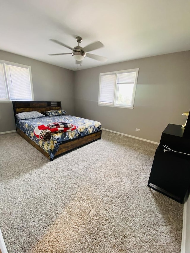 1106 Westfield Ln, Schaumburg, IL 60193 - bedroom featuring baseboards, carpet, and ceiling fan