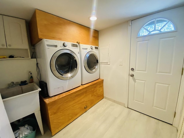 1106 Westfield Ln, Schaumburg, IL 60193 - washroom with wood finished floors, washer and clothes dryer, and a sink
