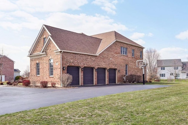 24 Wood Oaks Dr, South Barrington, IL 60010 - view of property exterior with brick siding, a yard, a garage, driveway, and a shingled roof