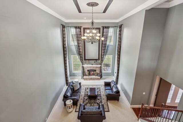 24 Wood Oaks Dr, South Barrington, IL 60010 - living room with a chandelier, baseboards, a fireplace, carpet flooring, and ornamental molding