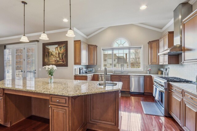 24 Wood Oaks Dr, South Barrington, IL 60010 - kitchen featuring stainless steel appliances, wall chimney range hood, a sink, a center island with sink, and dark wood-style floors