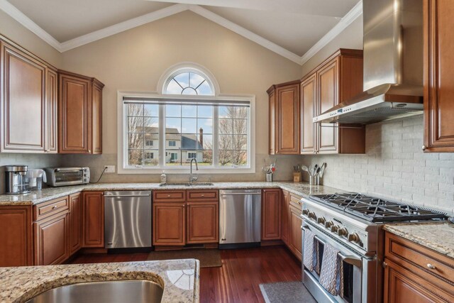 24 Wood Oaks Dr, South Barrington, IL 60010 - kitchen featuring stainless steel appliances, wall chimney exhaust hood, a sink, dark wood finished floors, and light stone countertops