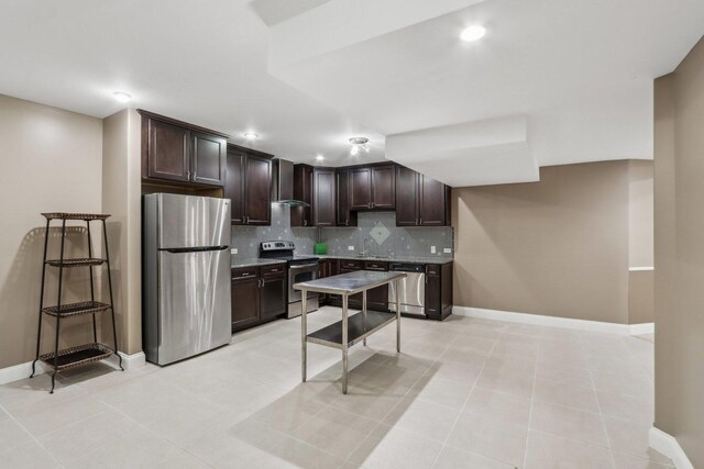 24 Wood Oaks Dr, South Barrington, IL 60010 - kitchen featuring stainless steel appliances, wall chimney exhaust hood, dark brown cabinets, tasteful backsplash, and recessed lighting