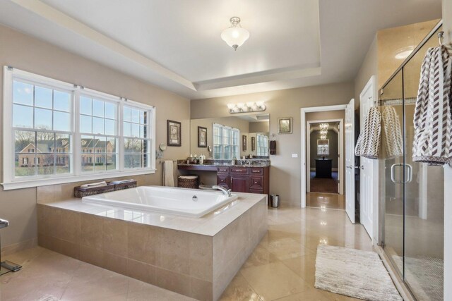 24 Wood Oaks Dr, South Barrington, IL 60010 - full bathroom with vanity, a bath, a raised ceiling, a stall shower, and baseboards