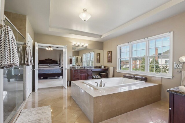 24 Wood Oaks Dr, South Barrington, IL 60010 - ensuite bathroom with a tray ceiling, a bath, vanity, and a shower stall