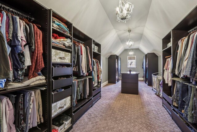 24 Wood Oaks Dr, South Barrington, IL 60010 - spacious closet with a chandelier, carpet floors, and vaulted ceiling