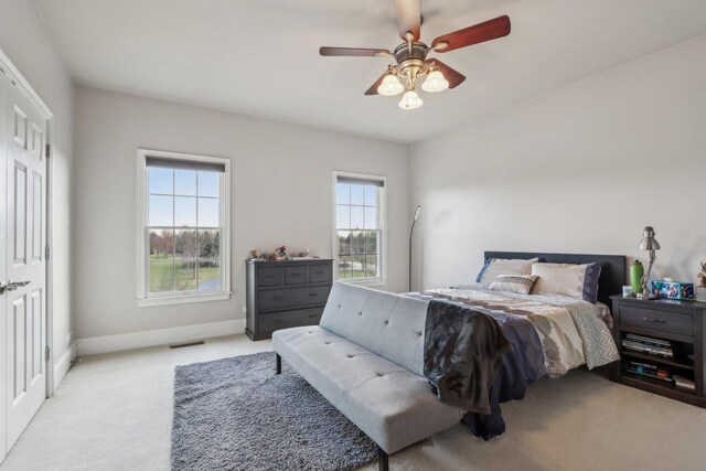 24 Wood Oaks Dr, South Barrington, IL 60010 - bedroom featuring light colored carpet, baseboards, and ceiling fan