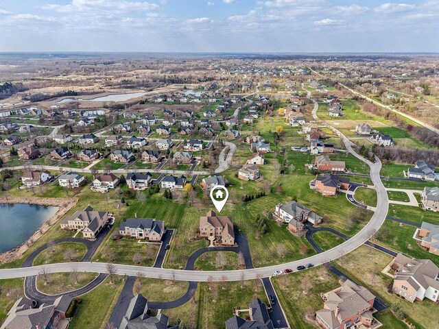 24 Wood Oaks Dr, South Barrington, IL 60010 - aerial view of property and surrounding area featuring nearby suburban area and a large body of water