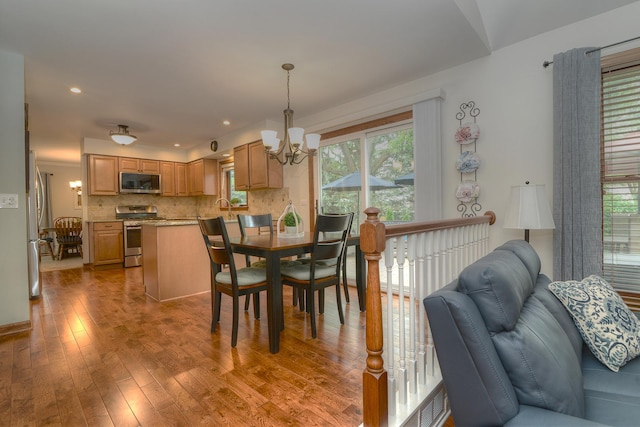 1344 Saddlebrook Rd, Bartlett, IL 60103 - dining room featuring a chandelier, wood finished floors, and recessed lighting