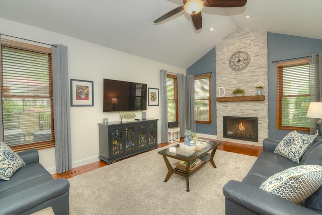 1344 Saddlebrook Rd, Bartlett, IL 60103 - living room with ceiling fan, wood finished floors, a fireplace, high vaulted ceiling, and recessed lighting