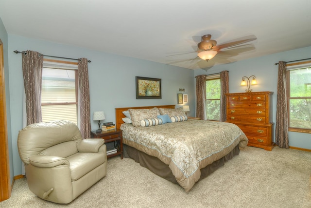 1344 Saddlebrook Rd, Bartlett, IL 60103 - bedroom with multiple windows, carpet flooring, and a ceiling fan
