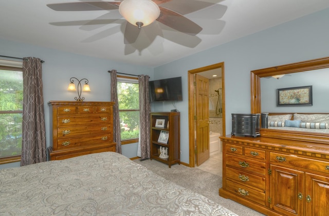1344 Saddlebrook Rd, Bartlett, IL 60103 - bedroom featuring light colored carpet, ensuite bath, and a ceiling fan
