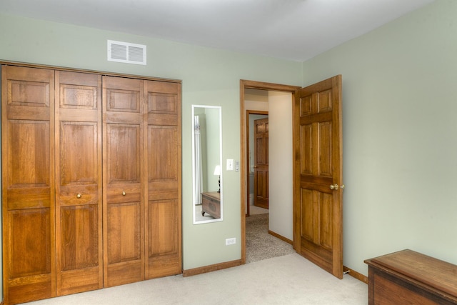 1344 Saddlebrook Rd, Bartlett, IL 60103 - unfurnished bedroom featuring light colored carpet and a closet