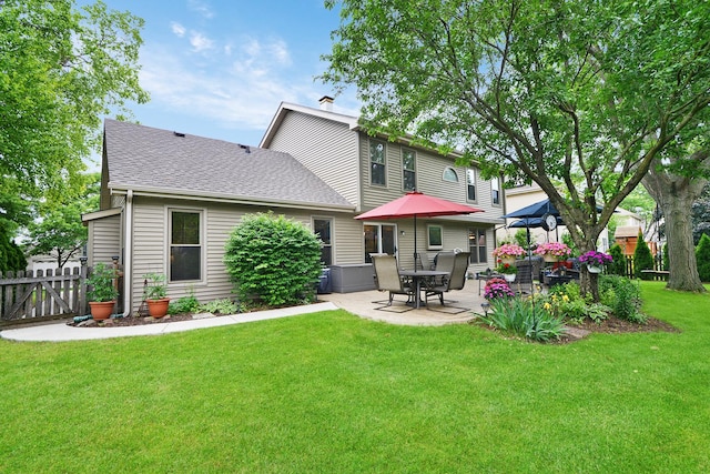 1344 Saddlebrook Rd, Bartlett, IL 60103 - rear view of house with a patio area and a shingled roof