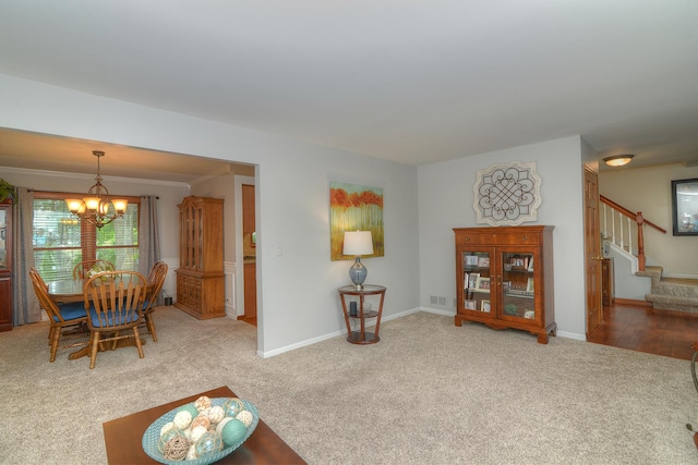 1344 Saddlebrook Rd, Bartlett, IL 60103 - dining space with carpet floors, a chandelier, and stairway