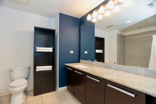5430 N Sheridan Rd Unit 703, Chicago, IL 60640 - bathroom with vanity, tile patterned flooring, toilet, a shower with curtain, and baseboards