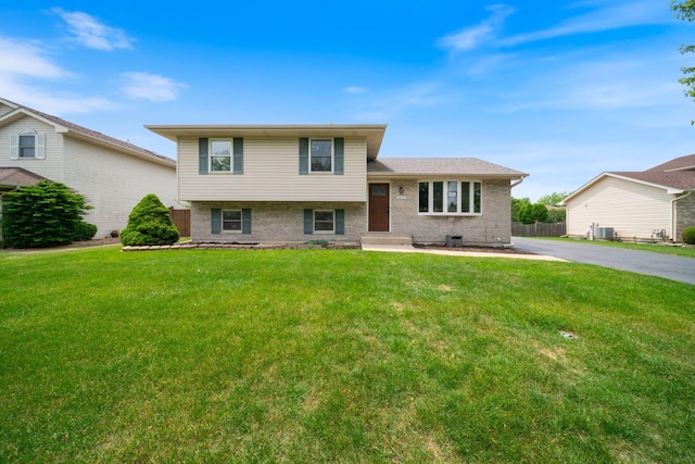 2113 Lolo Pass Dr, Plainfield, IL 60586 - split level home featuring brick siding and asphalt driveway