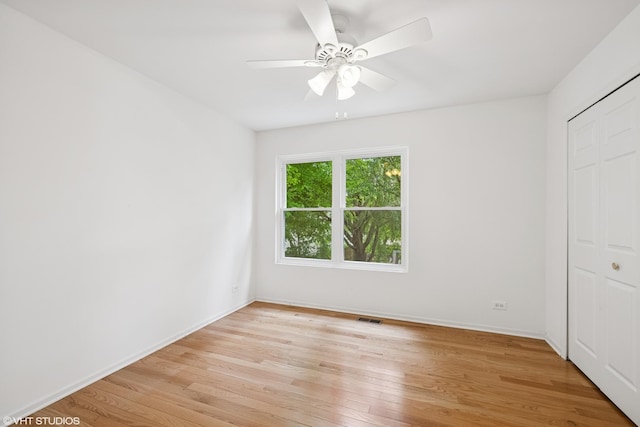 11 Litchfield Ct, Lake In The Hills, IL 60156 - unfurnished bedroom featuring light wood-style floors, a closet, and ceiling fan
