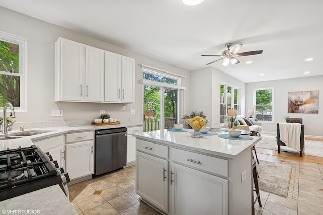 11 Litchfield Ct, Lake In The Hills, IL 60156 - kitchen with dishwasher, black gas stove, healthy amount of natural light, a ceiling fan, and recessed lighting