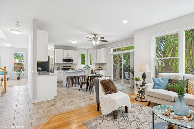 11 Litchfield Ct, Lake In The Hills, IL 60156 - living room featuring plenty of natural light, a ceiling fan, recessed lighting, and light tile patterned floors