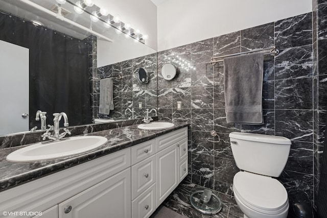 616 W Fulton St Unit 703, Chicago, IL 60661 - full bathroom with tile walls, marble finish flooring, and double vanity
