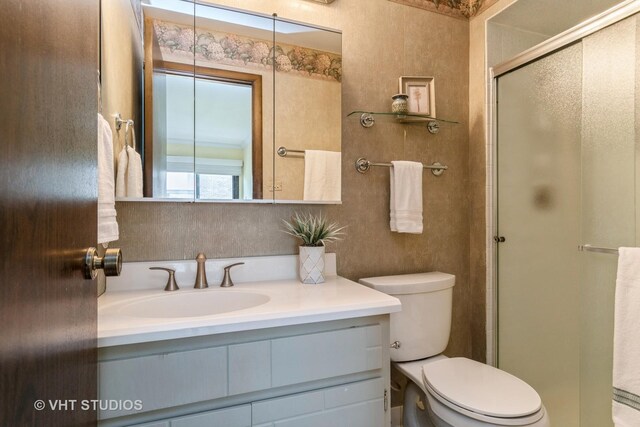 338 Sheridan Dr Unit 1F, Willowbrook, IL 60527 - full bathroom featuring a shower stall and vanity