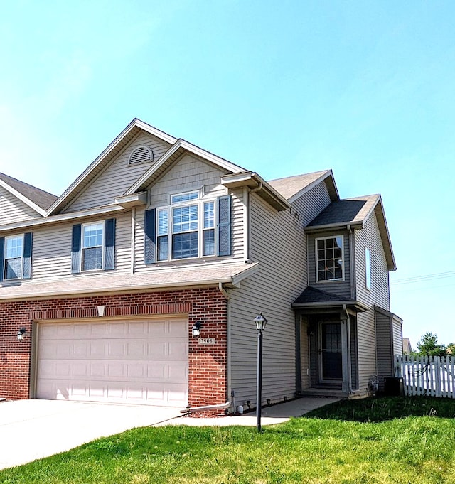 3908 Summer Sage Ct, Champaign, IL 61822 - view of front of property with a garage, concrete driveway, and brick siding