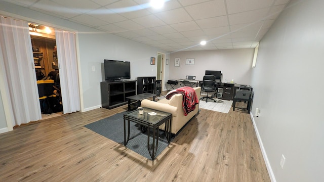 3908 Summer Sage Ct, Champaign, IL 61822 - living area with a desk, wood finished floors, and a paneled ceiling