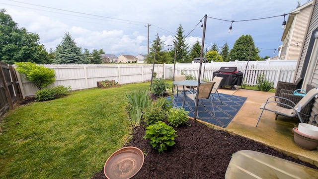 3908 Summer Sage Ct, Champaign, IL 61822 - fenced backyard with a patio area and outdoor dining area