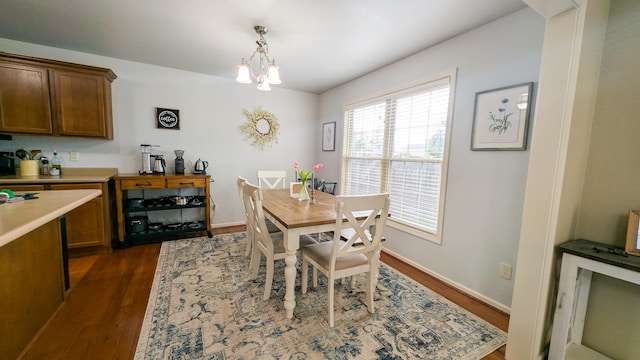 3908 Summer Sage Ct, Champaign, IL 61822 - dining area featuring dark wood-style flooring and a chandelier