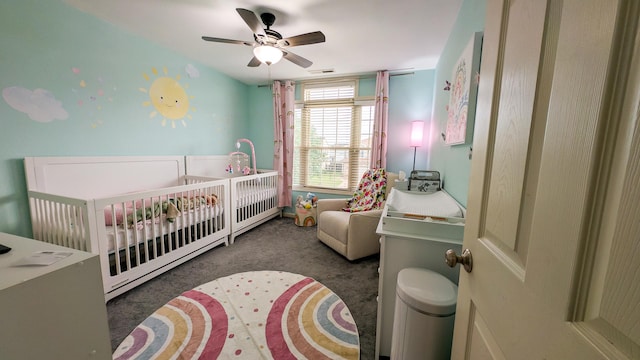 3908 Summer Sage Ct, Champaign, IL 61822 - carpeted bedroom featuring a crib and ceiling fan
